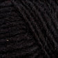 Close-up view of dark black Lopi Alafoss Icelandic Wool Yarn by Berroco, Inc., showing the intricate and textured fibers intertwined together. The yarn appears dense and thick, suitable for knitting cozy Icelandic pullovers or crocheting durable felted mittens.