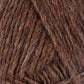 Close-up image of Lopi Alafoss Icelandic Wool Yarn by Berroco, Inc., showcasing brown yarn with mixed shades that reveal the textures of intertwined fibers. The thick, slightly rugged appearance includes hints of light and dark brown interwoven strands, making it perfect for crafting Icelandic pullovers.