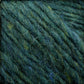 Close-up image of the Berroco, Inc. Lopi Alafoss Icelandic Wool Yarn in green and blue variegated hues, featuring a soft, fuzzy texture. The twisted yarn strands create a thick and cozy appearance reminiscent of traditional Icelandic pullovers. The blend of colors provides a natural, earthy feel.