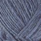 A close-up image of blue Lopi Alafoss Icelandic Wool Yarn by Berroco, Inc., showcasing the sharp details of the fibers and strands tightly wound together. The texture appears soft and slightly fuzzy, reminiscent of traditional Icelandic pullovers, with some visible loose fibers.