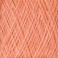 A close-up view of the JaggerSpun Maine Line 3/8 Yarn | Mini-cone fibers intersecting in a crisscross pattern, creating a textured surface. The Jagger Brothers, Inc. yarns are neatly arranged, showcasing the fine and soft threads that make up the material. The color is a warm, light shade of orange.