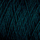 Close-up of soft, dark green JaggerSpun Maine Line 3/8 Yarn | Large Cone from Jagger Brothers, Inc., wound in a criss-cross pattern, showing the texture and layers of the fibers. The worsted spun yarn appears tightly wound, with visible details of the individual strands.