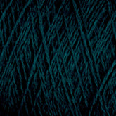 Close-up of soft, dark green JaggerSpun Maine Line 3/8 Yarn | Large Cone from Jagger Brothers, Inc., wound in a criss-cross pattern, showing the texture and layers of the fibers. The worsted spun yarn appears tightly wound, with visible details of the individual strands.