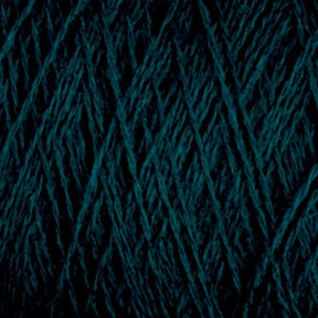 Close-up of soft, dark green JaggerSpun Maine Line 3/8 Yarn | Large Cone from Jagger Brothers, Inc., wound in a criss-cross pattern, showing the texture and layers of the fibers. The worsted spun yarn appears tightly wound, with visible details of the individual strands.