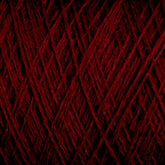 Close-up image of JaggerSpun Maine Line 3/8 Yarn | Mini-cone by Jagger Brothers, Inc., featuring its intricate, interwoven strands. The texture is soft with a deep, rich red color that fills the entire frame, highlighting the complexity and detail of the threads.