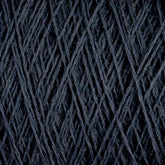 Close-up image of Jagger Brothers, Inc.'s JaggerSpun Maine Line 3/8 Yarn | Mini-cone in dark blue, wound in a crisscross pattern. The threads appear slightly textured and densely packed, creating a rich, uniform surface with an intricate design—true to the craftsmanship of JaggerSpun yarns.