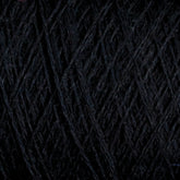 A close-up image of JaggerSpun Maine Line 2/8 Yarn | Mini-cone by Jagger Brothers, Inc. The worsted spun yarn is tightly wound, showcasing its fibrous texture and intricate overlapping strands. The detailed view highlights the thickness and subtle variations in the fiber, making it perfect for weaving or knitting projects.