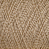 A close-up image of Jagger Brothers, Inc.'s JaggerSpun Maine Line 2/8 Yarn | Mini-cone in beige. The strands are tightly wound and crisscross in an intricate pattern, creating a textured appearance ideal for knitting. The image highlights the fibrous and detailed surface of this worsted spun yarn.