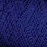 Close-up image of JaggerSpun Maine Line 2/8 Yarn | Mini-cone in blue by Jagger Brothers, Inc. The photo captures the intricate details of the tightly wound fibers, highlighting the texture and deep blue color of the yarn. The focus is on the crisscrossing strands, creating a pattern reminiscent of knitting throughout the image.