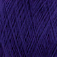 Close-up image of JaggerSpun Maine Line 2/8 Yarn | Mini-cone from Jagger Brothers, Inc., featuring deep purple worsted spun yarn intertwined in a crisscross pattern, showcasing the texture and individual fibers perfect for knitting.