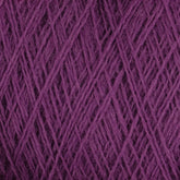 A close-up view of JaggerSpun Maine Line 2/8 Yarn in a rich purple hue, showing the intricately intertwined threads in a detailed, textured pattern. This image beautifully captures the vibrant color and fibrous texture of the yarn strands from Jagger Brothers, Inc., making it perfect for knitting or weaving.