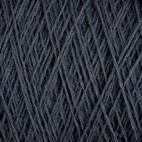 Close-up of the JaggerSpun Maine Line 2/8 Yarn | Mini-cone from Jagger Brothers, Inc. in dark gray, worsted spun and wrapped tightly in a crisscross pattern, showing the texture and fibers of the material. The strands are neatly organized, forming a geometric design with intersecting lines and varying shades of gray, perfect for knitting or weaving projects.