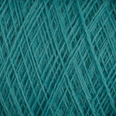 Close-up image of a tightly wound JaggerSpun Maine Line 2/20 Yarn | Mini-cone in turquoise. The texture of the worsted spun yarn fibers is clearly visible, showcasing the intertwining strands and the soft, fuzzy surface typical of medium grade wool or similar materials from Jagger Brothers, Inc.