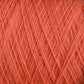 Close-up image of JaggerSpun Maine Line 2/20 Yarn | Large Cone by Jagger Brothers, Inc., capturing detailed interwoven fibers in various diagonal patterns. The soft and fuzzy texture highlights the intricate threads and stitches typical of knitting or crocheting materials.