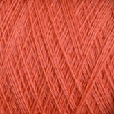 Close-up image of JaggerSpun Maine Line 2/20 Yarn | Large Cone by Jagger Brothers, Inc., capturing detailed interwoven fibers in various diagonal patterns. The soft and fuzzy texture highlights the intricate threads and stitches typical of knitting or crocheting materials.