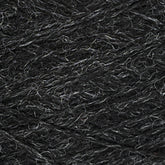 Close-up of dark grey JaggerSpun Heather 2/8 | Mini-cone yarn from Jagger Brothers, Inc., showcasing the detailed texture of twisted fibers interspersed with fine light grey threads. The intricate pattern accentuates the softness and structure of the worsted spun wool.