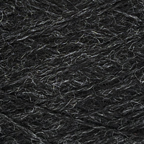 Close-up image of a dark grey yarn, showing the texture and individual fibers woven together tightly. The JaggerSpun Heather 2/8 from Jagger Brothers, Inc. exhibits a worsted spun composition with a blend of slightly lighter and darker grey strands, resulting in a subtle, natural mottled appearance.