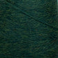 A close-up view of a spool of dark green yarn. The JaggerSpun Heather 2/8 Mini-cone from Jagger Brothers, Inc. is tightly wound, showcasing its texture and slight fuzziness. The image highlights the various shades of green within the wool, dyed using low-impact synthetic dyes for an eco-friendly touch.