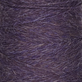 A close-up of a spool of Jagger Brothers, Inc.'s JaggerSpun Heather 2/8 yarn in purple. The texture is clearly visible, showing the intertwined fibers and subtle variations in the purple hue, created using low-impact synthetic dyes for a slightly heathered appearance. The yarn looks soft and slightly fuzzy.