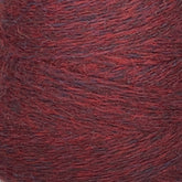 A close-up of JaggerSpun Heather 2/8 Mini-cone yarns from Jagger Brothers, Inc., featuring interwoven strands in varying shades that create a textured and detailed pattern. The worsted spun wool exudes a soft and slightly fuzzy appearance, beautifully showcasing the rich and deep red hues dyed with low-impact synthetic dyes, along with subtle hints of other colors.