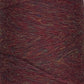 Close-up of a mini-cone of JaggerSpun Heather 2/8 yarn from Jagger Brothers, Inc., showcasing a blend of dark red, brown, and subtle hints of blue and yellow. The worsted spun wool has a slightly coarse texture with a heathered appearance, where individual fibers are visible.