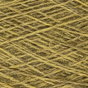 Close-up of a ball of light green yarn, showing the intricate, crisscrossing pattern of the fibers. The worsted spun texture is slightly coarse and fibrous, with varied shades of green providing a natural and organic appearance, exemplifying the quality typical of Jagger Brothers, Inc.'s JaggerSpun Heather 2/8 Large Cone yarn.