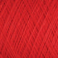 Close-up image of vibrant red JaggerSpun Superfine Merino 2/18 Yarn | Mini-cone by Jagger Brothers, Inc., showcasing a crisscross pattern of tightly wound fibers. The texture appears soft, with fine threads intricately interwoven to form a solid and consistent surface.