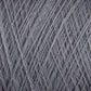 Close-up image of the JaggerSpun Superfine Merino 2/18 Yarn | Mini-cone by Jagger Brothers, Inc. The light gray threads are tightly wound together, showcasing intricate texture and pattern. The light captures the soft fibers, emphasizing the smooth and delicate texture of this hand knitters yarn.