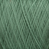 Close-up image of a mini-cone of light green Jagger Brothers, Inc.'s JaggerSpun Superfine Merino 2/18 Yarn, showcasing the texture and interwoven strands. The fibers appear soft and consistent in thickness, making them ideal for knitting or crocheting projects. The worsted spun yarn ensures a smooth finish, perfect for hand knitters.