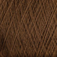 Close-up image of JaggerSpun Superfine Merino 2/18 Yarn | Mini-cone by Jagger Brothers, Inc., showcasing the worsted spun yarn wound tightly in a crisscross pattern. The rich brown Merino wool yarn exhibits a slightly textured surface, highlighting the intricacy of the fibers and their uniform arrangement. The background is filled entirely with this exquisite hand knitters yarn.