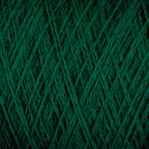 Close-up view of a tightly-wound mini-cone of dark green JaggerSpun Superfine Merino 2/18 Yarn by Jagger Brothers, Inc. The yarn appears soft and finely textured, with the fibers creating a uniform diagonal pattern across the surface.