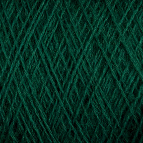 Close-up of dark green JaggerSpun Superfine Merino 2/18 Yarn | Mini-cone by Jagger Brothers, Inc. intertwined in a crisscross pattern. The texture appears soft and slightly fuzzy, showcasing the fiber detail and structure of a thick yarn ball.