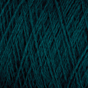 A close-up view of JaggerSpun Superfine Merino 2/18 Yarn in teal from Jagger Brothers, Inc. reveals intertwined fibers creating a detailed, crisscross pattern. The yarn appears thick and soft, perfect for knitting or crocheting.