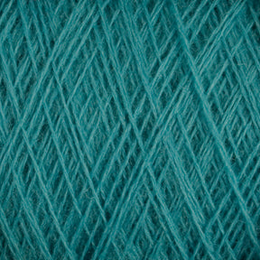 Close-up image of Jagger Brothers, Inc.'s blue-green *JaggerSpun Superfine Merino 2/18 Yarn | Large Cone* intertwined in a crisscross pattern, showing the texture and fine fibers of the threads. The detailed view highlights the intricate arrangement and tightly wound strands of yarn, perfect for hand knitters seeking a worsted weight option.