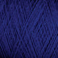 A close-up image of Jagger Brothers, Inc.'s JaggerSpun Superfine Merino 2/18 Yarn (Mini-cone) in dark blue. The tightly wound strands create a textured, overlapping pattern with clearly visible fibers, giving the image a rich and intricate appearance ideal for hand knitters.