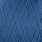 Close-up image of JaggerSpun Superfine Merino 2/18 Yarn from Jagger Brothers, Inc. spun into fine, evenly distributed threads. The texture appears soft and slightly fuzzy, indicating a high-quality merino wool blend. The yarn is tightly wound on a large cone, showcasing intricate overlaps and layering—a perfect choice for hand knitters seeking worsted weight quality.