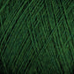 Close-up of JaggerSpun Superfine Merino 2/18 Yarn | Large Cone from Jagger Brothers, Inc., displaying green merino wool yarn strands tightly wound together, creating a textured pattern. The yarn appears slightly fuzzy and is uniformly colored, perfect for hand knitters seeking a worsted weight option.