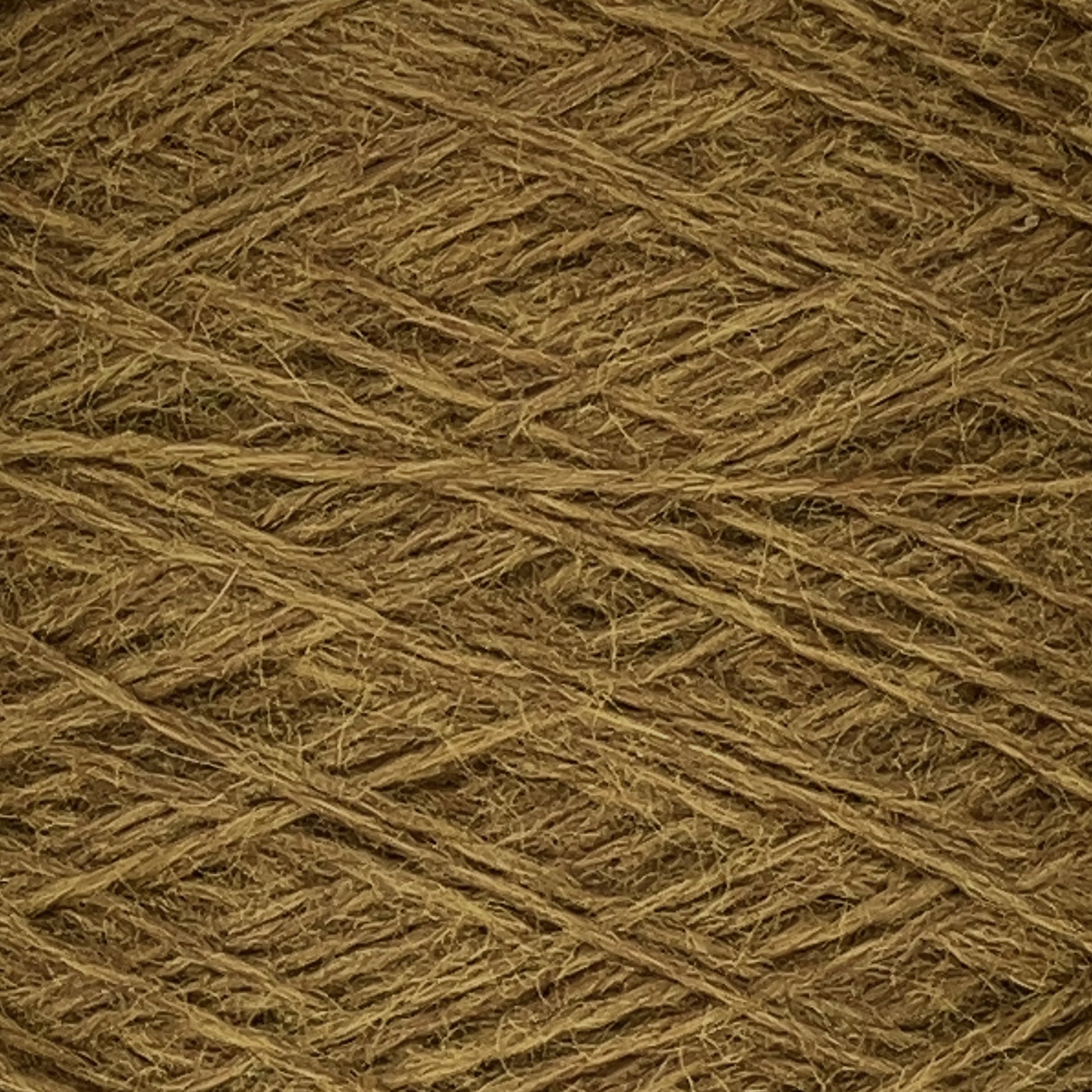 Close-up of JaggerSpun Zephyr Wool-Silk 2/18 Yarn from Jagger Brothers, Inc. The texture reveals multiple strands tightly wound together, with visible fibers creating a slightly rough surface. The image highlights the intricate pattern and details of the yarn's weave.