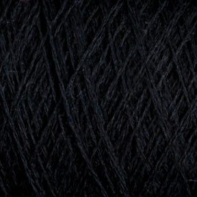 Close-up of JaggerSpun Zephyr Wool-Silk 2/18 Yarn by Jagger Brothers, Inc., showcasing its black yarn with a visible texture and interwoven strands forming a crisscross pattern. The slightly fuzzy surface highlights the luxurious fibrous nature of this premium blend, combining fine silk with Australian merino wool for unparalleled softness and quality in this large cone format.