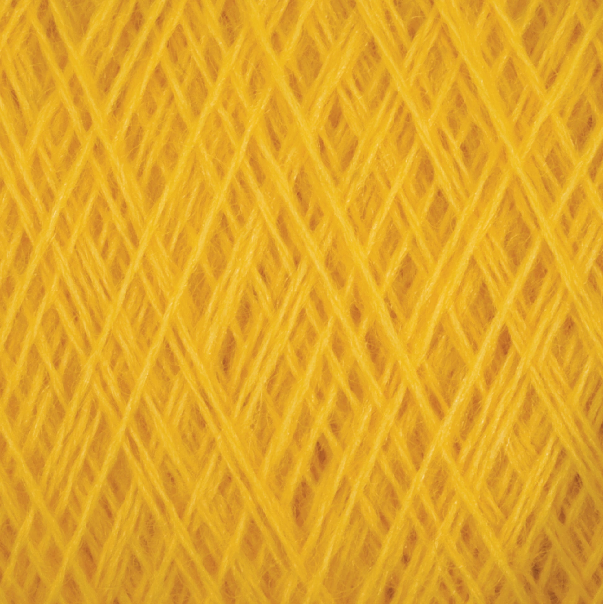 Close-up image of bright yellow JaggerSpun Zephyr Wool-Silk 2/18 Yarn from Jagger Brothers, Inc., with luxurious strands intertwined in a crisscross pattern, creating a vibrant, textured surface. The smooth and uniform fibers provide a visually appealing, intricate mesh.