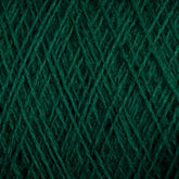 Close-up of JaggerSpun Zephyr Wool-Silk 2/18 Yarn in dark green, revealing the intricate crisscross pattern of the fibers. The texture appears soft and fuzzy, perfect for knitting or crocheting. The image highlights the detailed weave and rich color of this luxurious yarn from Jagger Brothers, Inc.