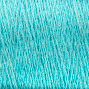 Close-up image of JaggerSpun Zephyr Wool-Silk 2/18 Yarn | Mini-cone in light blue, showcasing the intricate and tightly spun fibers by Jagger Brothers, Inc. The texture appears soft and slightly fuzzy, with a consistent and even pattern throughout—a testament to its luxurious yarn quality.