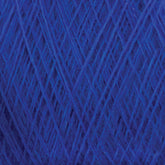 A close-up image of Jagger Brothers, Inc.'s JaggerSpun Zephyr Wool-Silk 2/18 Yarn in deep blue. The yarn, wound tightly on a large cone, crisscrosses in multiple overlapping layers, creating a textured and intricate pattern. The vibrant blue color stands out prominently, showcasing its premium silk quality.