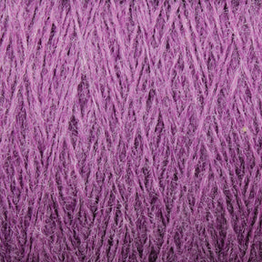 Close-up of luxurious JaggerSpun Zephyr Wool-Silk 2/18 Yarn from Jagger Brothers, Inc. in deep, rich purple, showcasing intricate woven fibers and texture. The slightly fluffy, soft strands create a detailed pattern, enhancing visual warmth and coziness. This yarn blend features premium silk for an added touch of elegance.