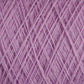 Close-up image of a ball of JaggerSpun Zephyr Wool-Silk 2/18 Yarn in pink, showcasing its interwoven strands that form a textured pattern. The yarn, made by Jagger Brothers, Inc., appears soft and fluffy—ideal for knitting, crocheting, or other crafts. Crafted from luxurious Australian merino wool blended with silk, the background is completely filled with the yarn to emphasize its texture and color.