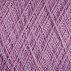 Close-up image of a ball of JaggerSpun Zephyr Wool-Silk 2/18 Yarn in pink, showcasing its interwoven strands that form a textured pattern. The yarn, made by Jagger Brothers, Inc., appears soft and fluffy—ideal for knitting, crocheting, or other crafts. Crafted from luxurious Australian merino wool blended with silk, the background is completely filled with the yarn to emphasize its texture and color.