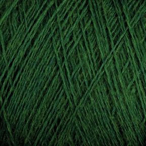 Close-up image of the luxurious JaggerSpun Zephyr Wool-Silk 2/18 Yarn by Jagger Brothers, Inc., showcasing its intricate crisscrossing fibers and texture. The yarn appears thick and tightly wound, with a rich, deep green hue.