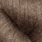 Close-up image of Jagger Brothers, Inc.'s JaggerSpun Zephyr Wool-Silk 2/18 Yarn | Large Cone. The luxurious yarn has a slightly shiny appearance and a dense interwoven pattern, showcasing its soft and fibrous nature.