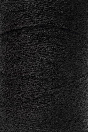 A close-up of a spool of Maurice Brassard's Cotton Bouclé Yarn in black, showcasing its texture and tightly wound fibers. The yarn appears slightly fuzzy, indicating a soft cotton material. The image highlights the uniformity and consistency of the winding, making it perfect for weaving projects.