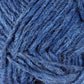 A close-up of a ball of Berroco, Inc.'s Léttlopi (Lite Lopi) Icelandic Wool Yarn. The fibers are thick and intertwined, showcasing a variety of blue tones that range from light to dark. The texture appears soft and slightly fuzzy, with some loose strands visible, making it perfect for creating durable garments with intricate colorwork knitting designs.